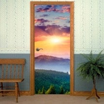 Decorative vinyl doors sunset in the mountains