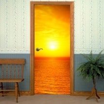 Decorative vinyl doors sea at sunset