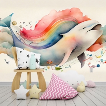 Wallpaper or mural children's drawing watercolor whale in clouds and rainbows