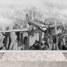 Wallpaper or mural classic airplane flies over new york black and white